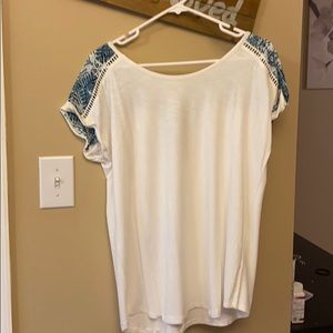 White tribal design shirt with partial open back